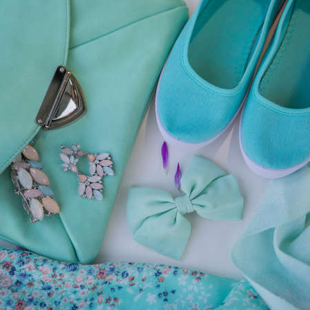 Blue scarf in shopping bag with tag isolated on a white backgroundの写真素材