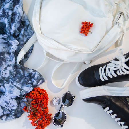A collection of summer clothes in casual style on a white backgroundの写真素材