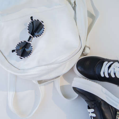 A collection of summer clothes in casual style on a white backgroundの写真素材