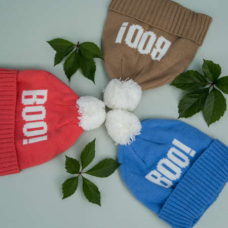 knitted caps with inscriptions in different colorsの写真素材
