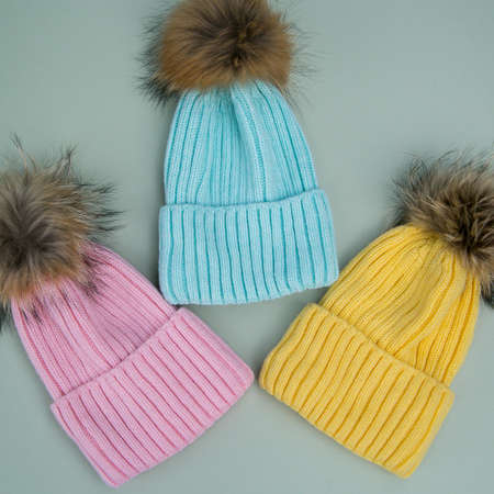 knitted caps with inscriptions in different colorsの写真素材