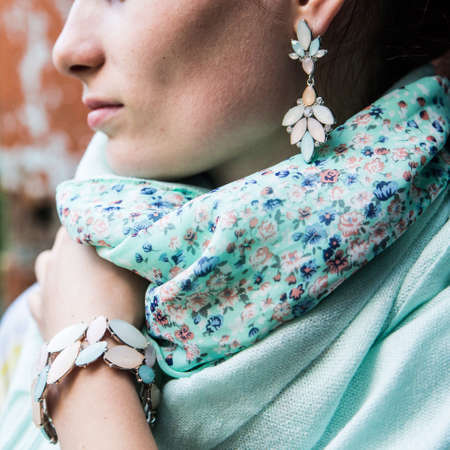 Women's scarf around the neck of a womanの写真素材