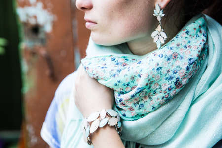 Women's scarf around the neck of a woman