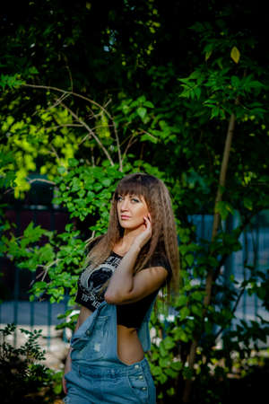girl model nature posing in different clothesの写真素材