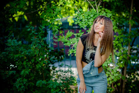girl model nature posing in different clothesの写真素材