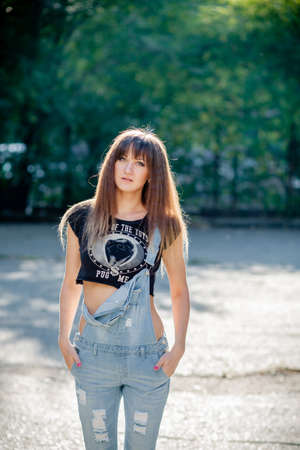 girl model nature posing in different clothesの写真素材