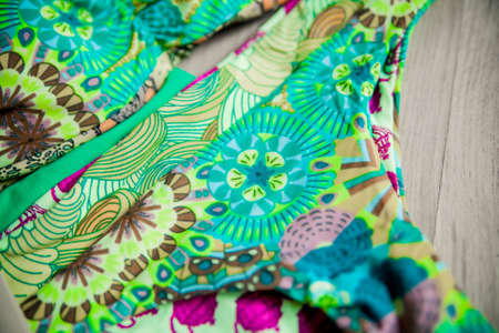 Teal one piece swimsuit isolated on white background.の写真素材