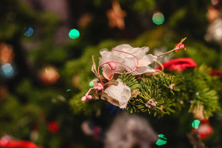 Decorated Christmas tree on  blurred, sparkling and fairy backgroundの写真素材