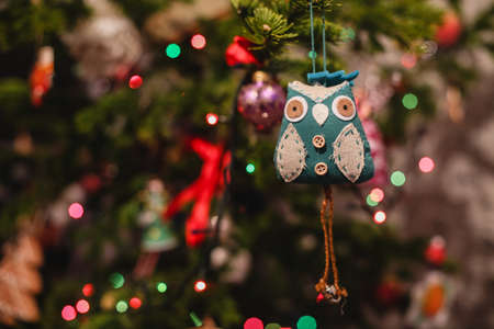 Decorated Christmas tree on  blurred, sparkling and fairy backgroundの写真素材