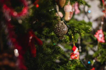 Decorated Christmas tree on  blurred, sparkling and fairy backgroundの写真素材