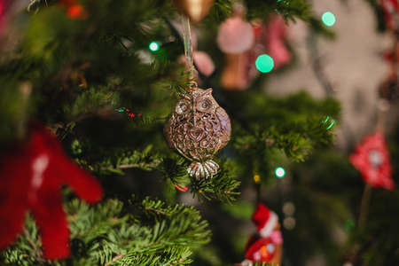 Decorated Christmas tree on  blurred, sparkling and fairy backgroundの写真素材
