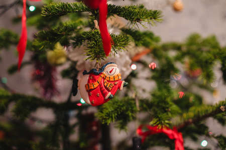 Decorated Christmas tree on  blurred, sparkling and fairy backgroundの写真素材