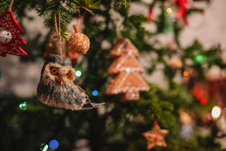 Decorated Christmas tree on  blurred, sparkling and fairy backgroundの写真素材