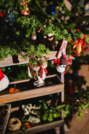 Decorated Christmas tree on  blurred, sparkling and fairy backgroundの写真素材