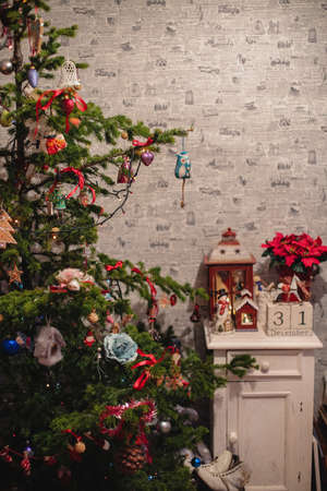 Decorated Christmas tree on  blurred, sparkling and fairy backgroundの写真素材