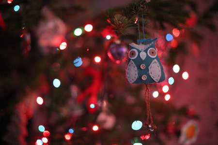 Decorated Christmas tree on  blurred, sparkling and fairy backgroundの写真素材