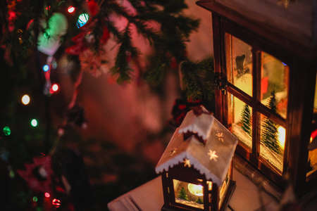 Decorated Christmas tree on  blurred, sparkling and fairy backgroundの写真素材