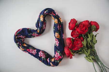 scarf on wooden background is difficult to see heart