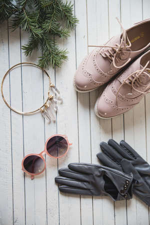 various women's accessories on wooden backgroundの写真素材