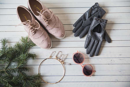 various women's accessories on wooden backgroundの写真素材