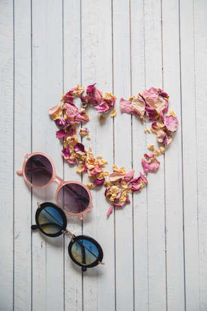 various women's accessories on wooden backgroundの写真素材