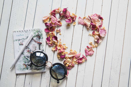 various women's accessories on wooden backgroundの写真素材