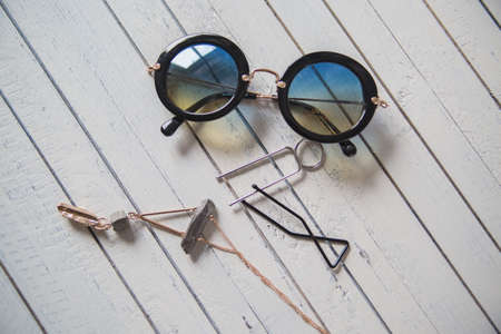 various women's accessories on wooden backgroundの写真素材