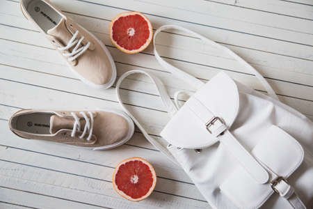 various women's accessories on wooden backgroundの写真素材