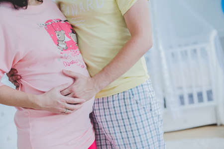 Beautiful elegant woman waiting a baby.の写真素材