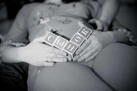 Pregnancy and beautiful cubes that are on the backgroundの写真素材