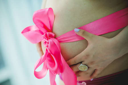 beautiful pregnant woman in the waiting period of the childの写真素材