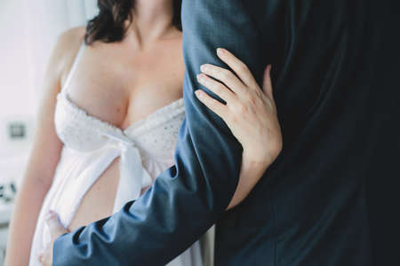 Beautiful elegant woman waiting a baby.の写真素材