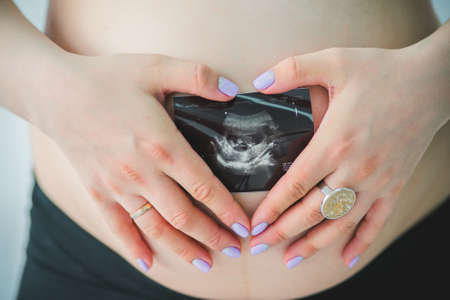 beautiful pregnant woman in the waiting period of the child