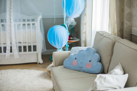 Crib and soft baby toys at children's room. Toys are officially property released.の写真素材