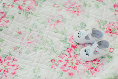 children's clothing and shoes on wooden backgroundの写真素材