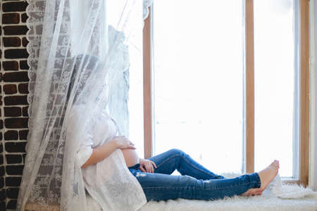 beautiful pregnant woman in the waiting period of the childの写真素材