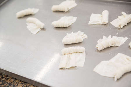 production of Oriental sweets with dough and flourの写真素材