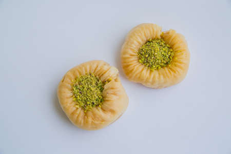 Baklava is a Middle-Eastern dessert. It is a rich, sweet pastry made of layers of filo filled with chopped nutsの写真素材