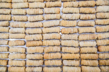 Baklava is a Middle-Eastern dessert. It is a rich, sweet pastry made of layers of filo filled with chopped nutsの写真素材