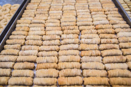 Baklava is a Middle-Eastern dessert. It is a rich, sweet pastry made of layers of filo filled with chopped nutsの写真素材