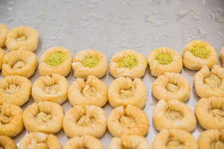 Baklava is a Middle-Eastern dessert. It is a rich, sweet pastry made of layers of filo filled with chopped nutsの写真素材