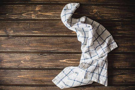 Kitchen table with a blue towel. Top view with copy spaceの写真素材
