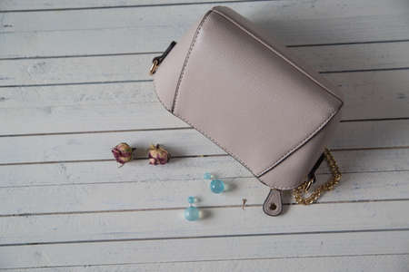 various women's accessories on wooden backgroundの写真素材