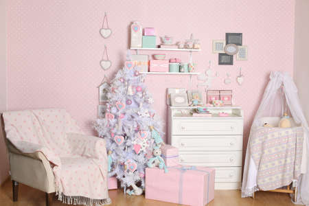 White Christmas tree in a festive interior