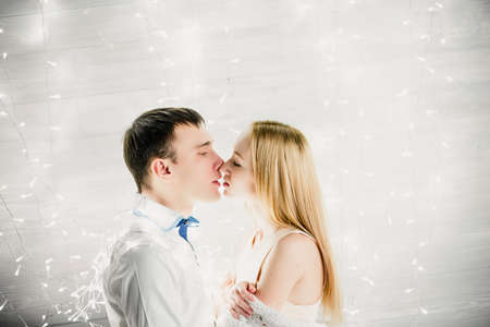 Christmas Couple.Happy Smiling Family at home celebrating.New Year People.の写真素材