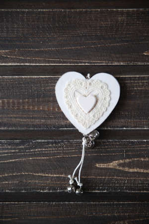 heart on wooden background as a symbolの写真素材