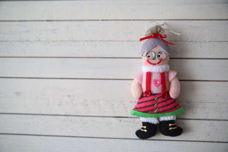 Christmas toy on a wooden background
