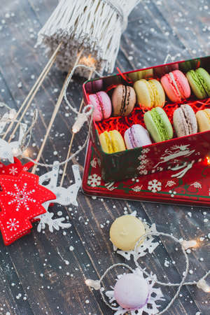 Christmas macarons with a crushed candy cane fillingの写真素材