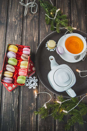 Christmas macarons with a crushed candy cane fillingの写真素材