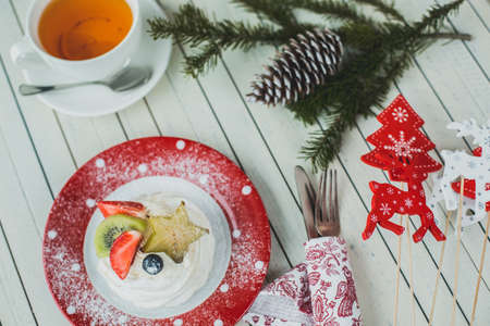 Beautiful white dessert on a red napkin